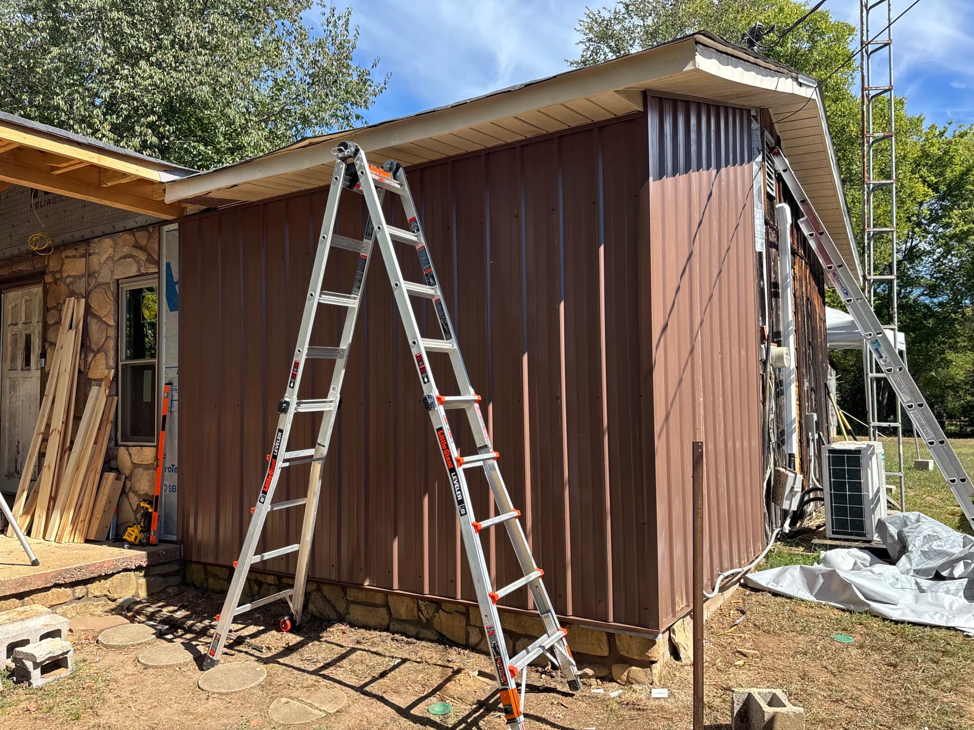 Gallery photos for Old Wood Siding Replaced With Clean Metal Panel Finish: Image #4