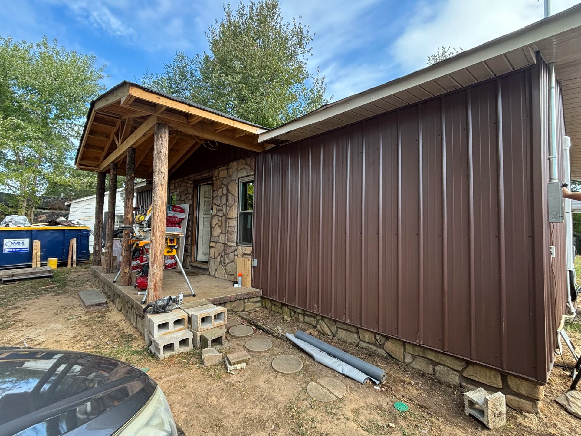Gallery photos for Old Wood Siding Replaced With Clean Metal Panel Finish: Image #7