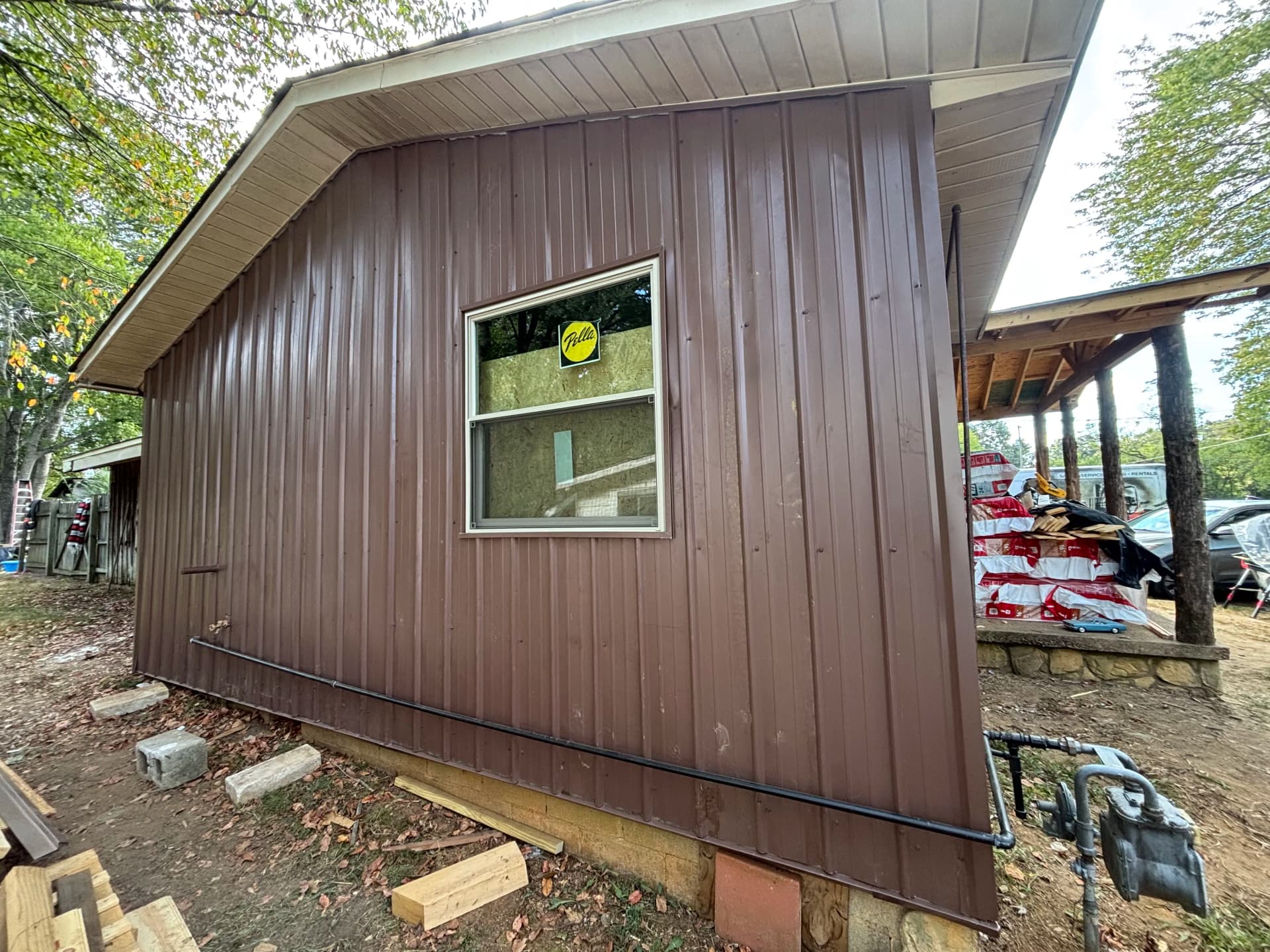 Gallery photos for Old Wood Siding Replaced With Clean Metal Panel Finish: Image #8
