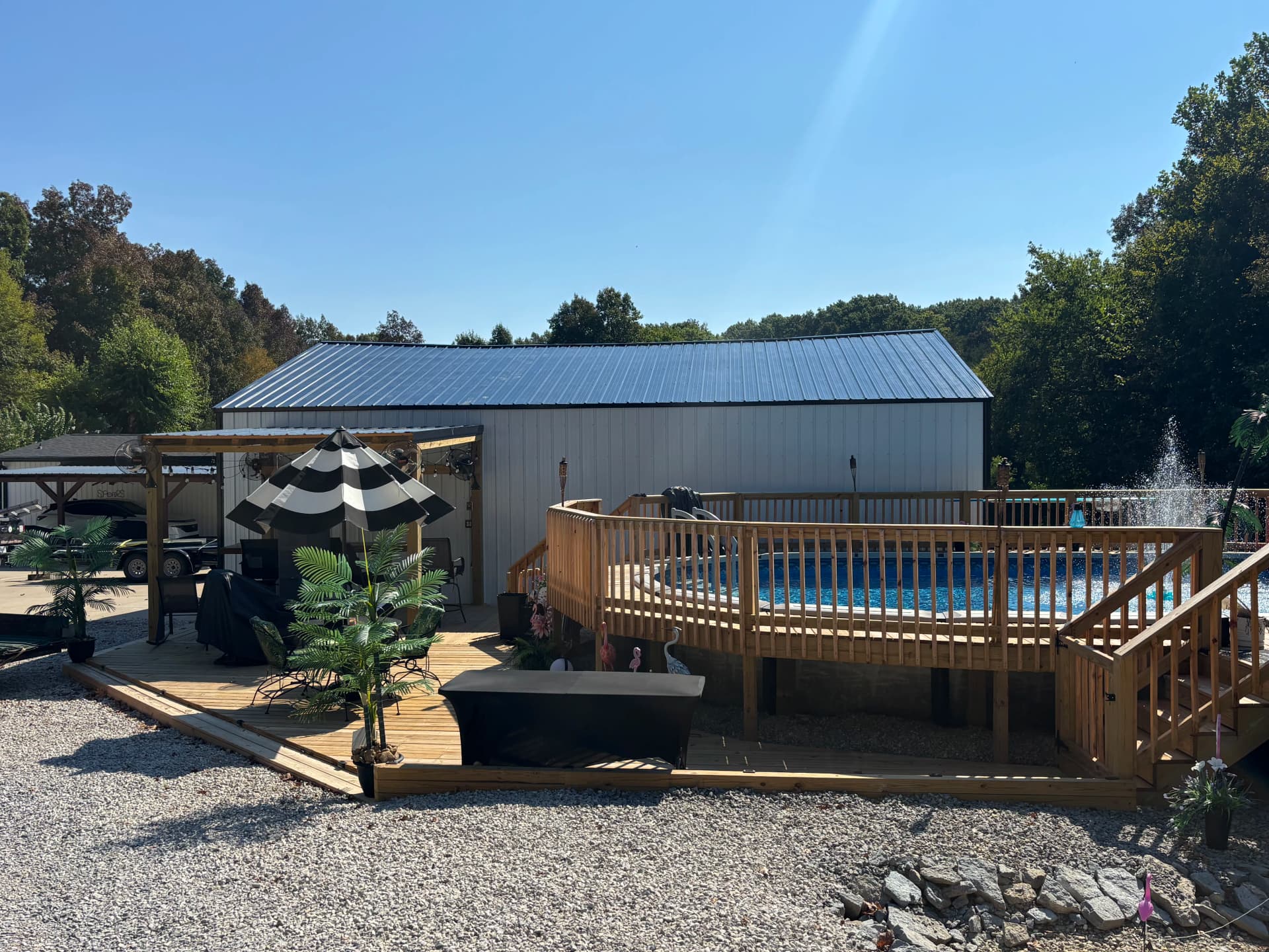 Gallery photos for Shop Gets a Full Metal Siding Overhaul - White, Black Trim, Black Roof: Image #5