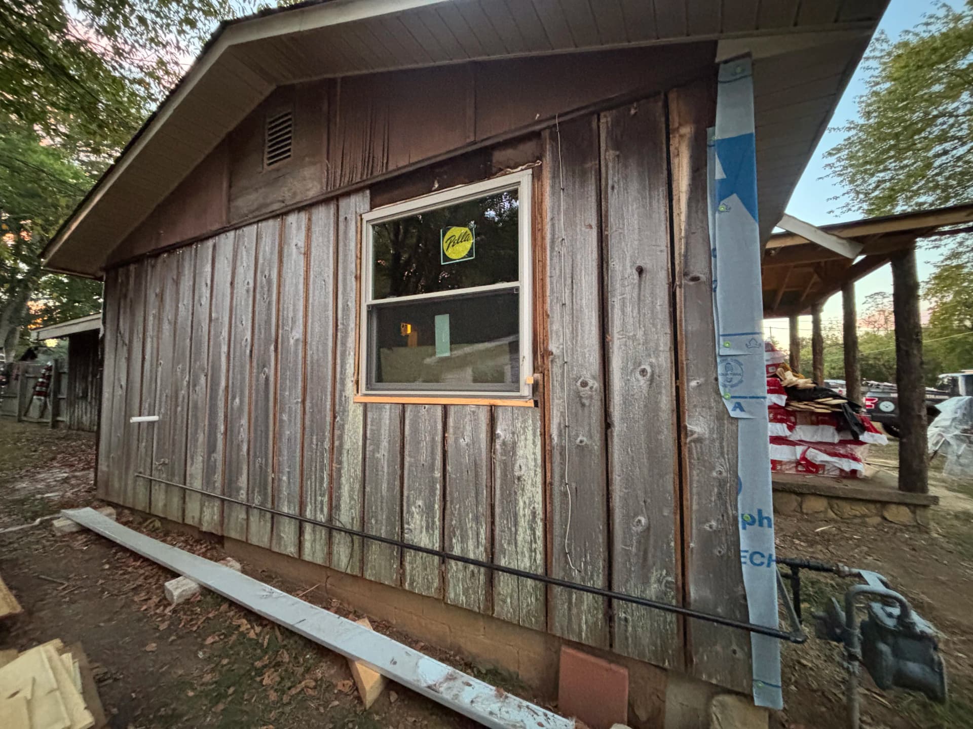 Gallery photos for Old Wood Siding Replaced With Clean Metal Panel Finish: Image #3