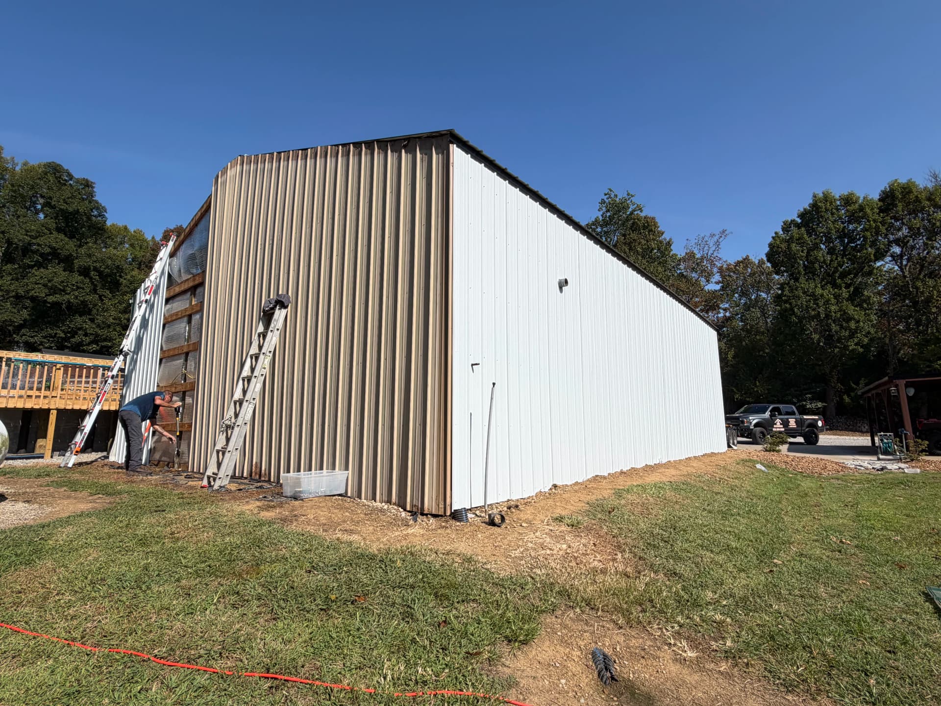 Gallery photos for Shop Gets a Full Metal Siding Overhaul - White, Black Trim, Black Roof: Image #8