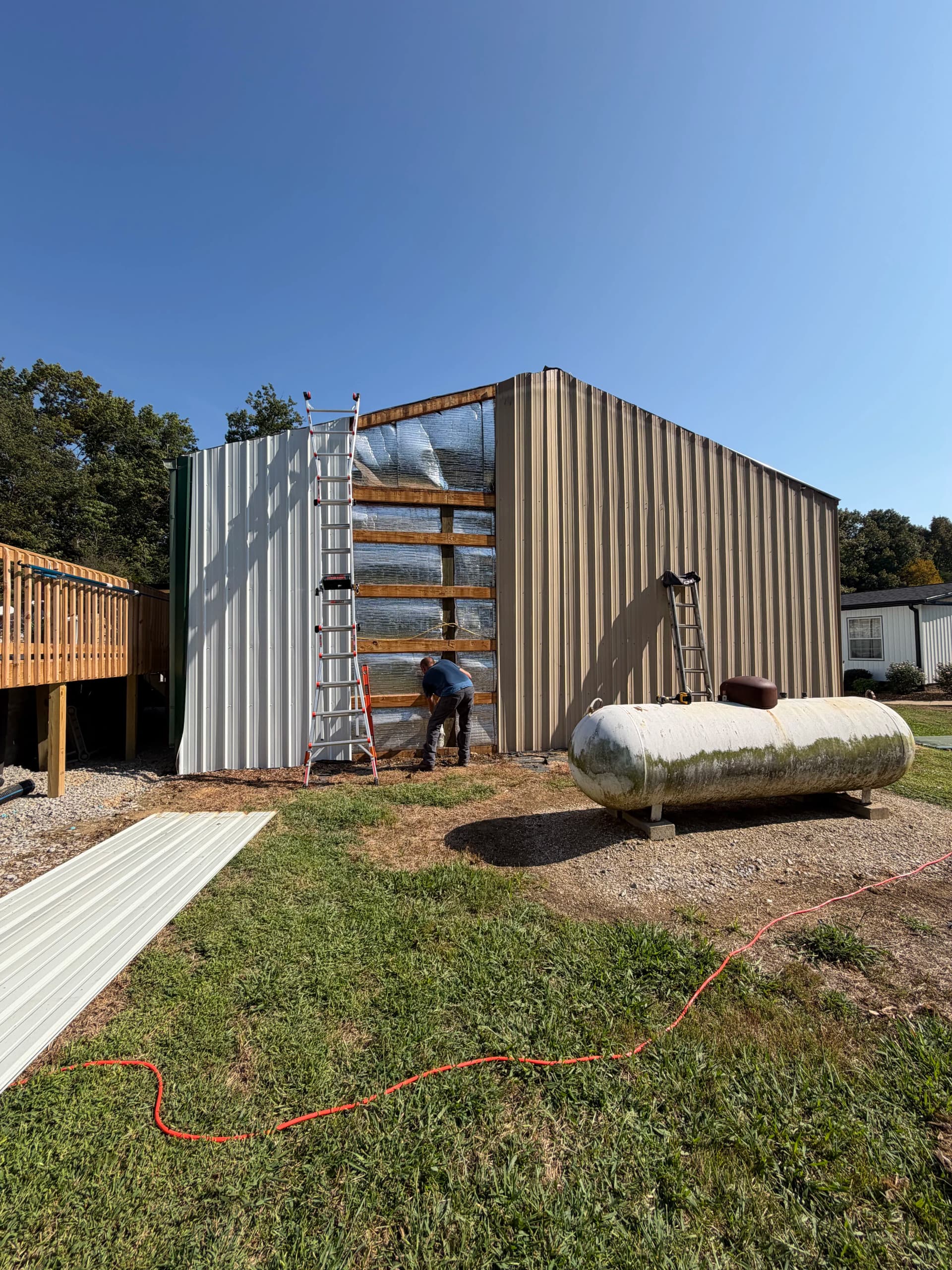 Gallery photos for Shop Gets a Full Metal Siding Overhaul - White, Black Trim, Black Roof: Image #9