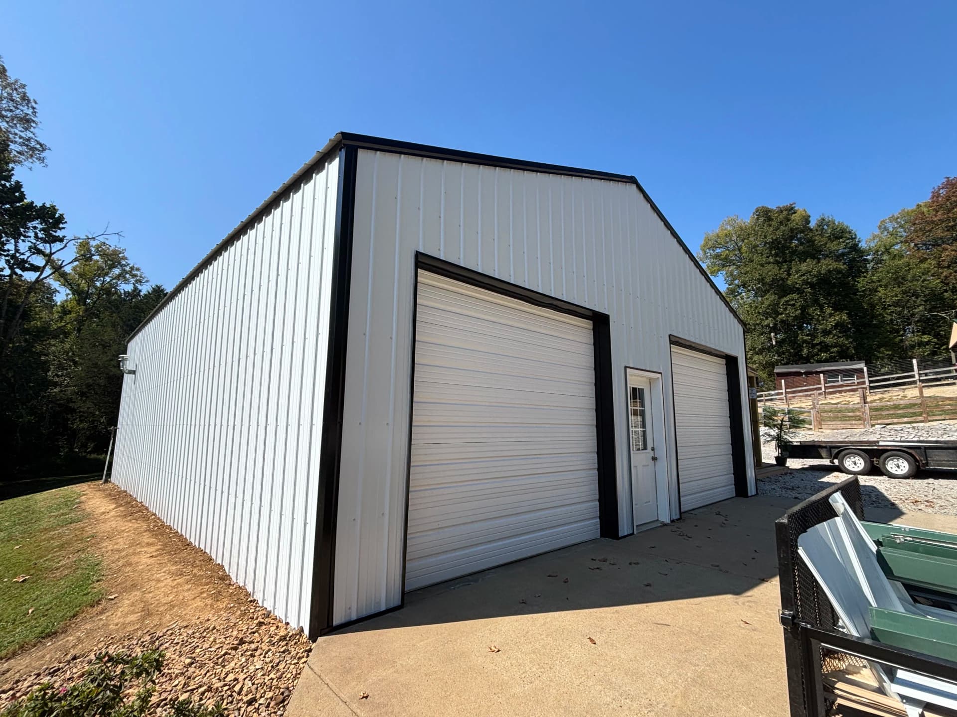 Gallery photos for Shop Gets a Full Metal Siding Overhaul - White, Black Trim, Black Roof: Image #2