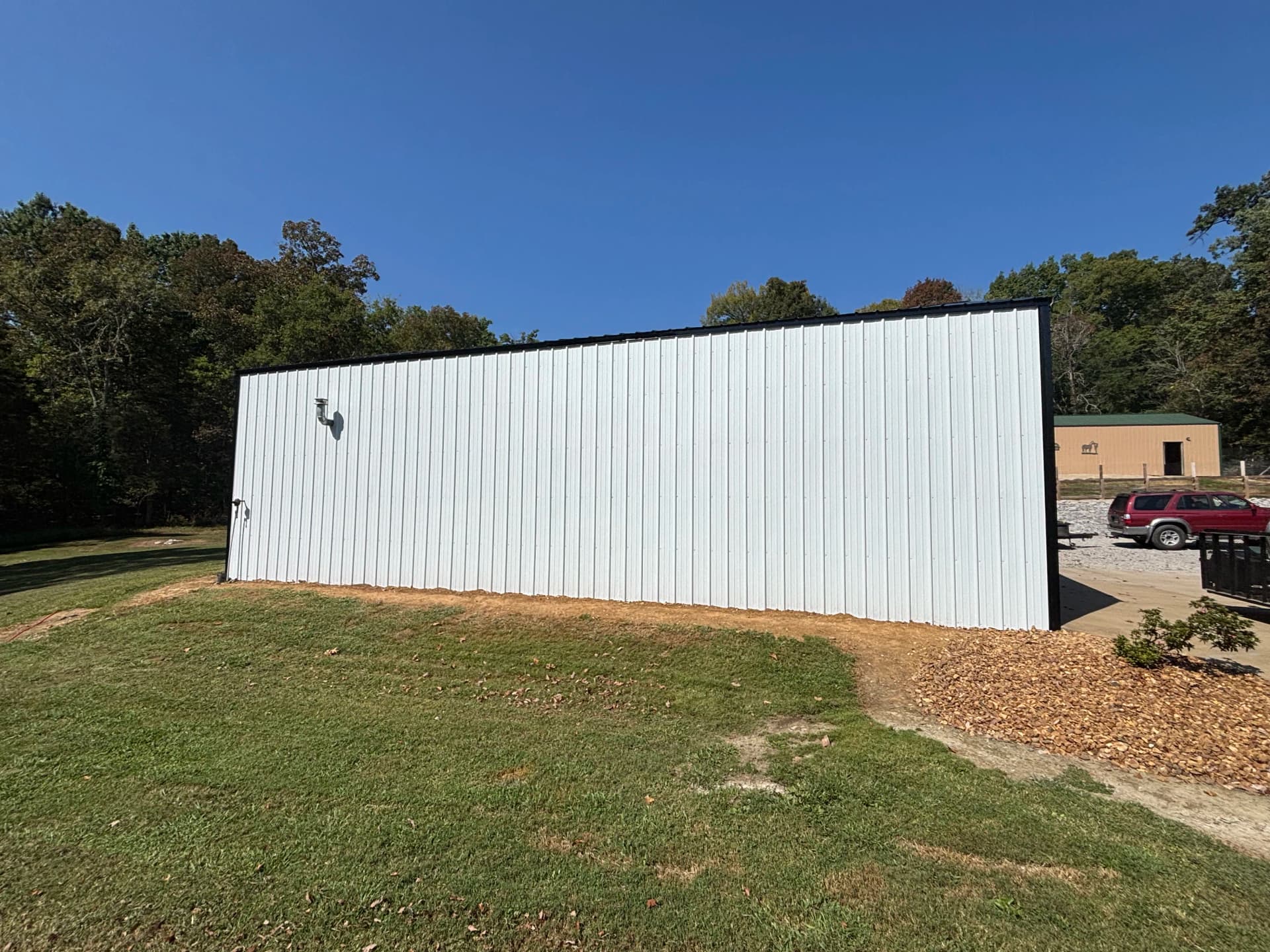 Gallery photos for Shop Gets a Full Metal Siding Overhaul - White, Black Trim, Black Roof: Image #1