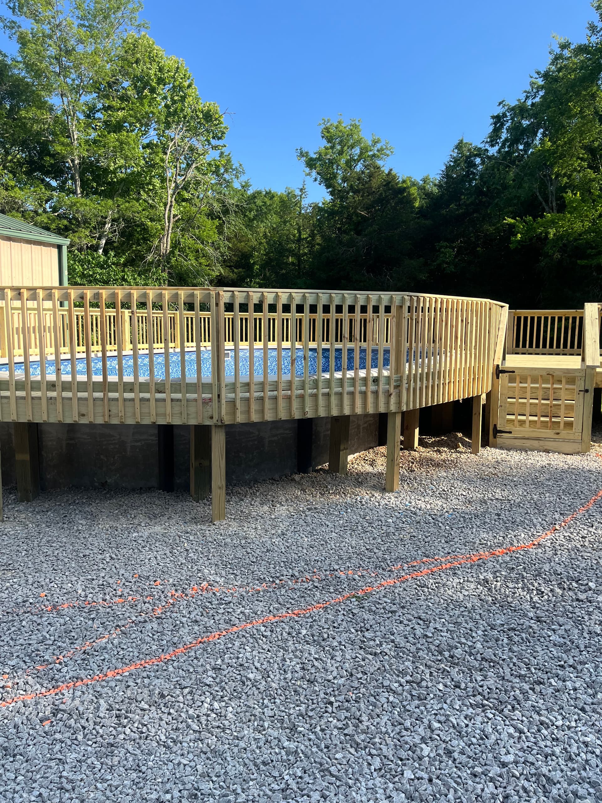 Gallery photos for Above Ground Pool Gets a Full Wrap-Around Deck Build: Image #7