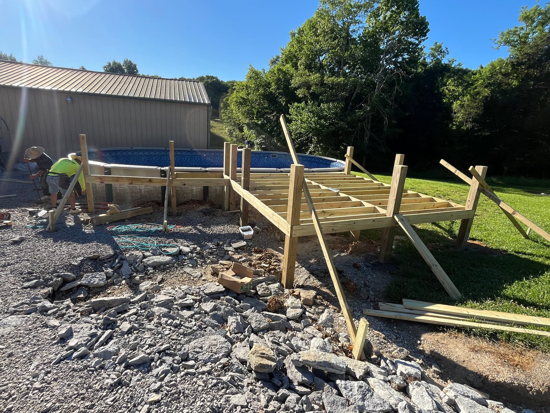 Gallery photos for Above Ground Pool Gets a Full Wrap-Around Deck Build: Image #4