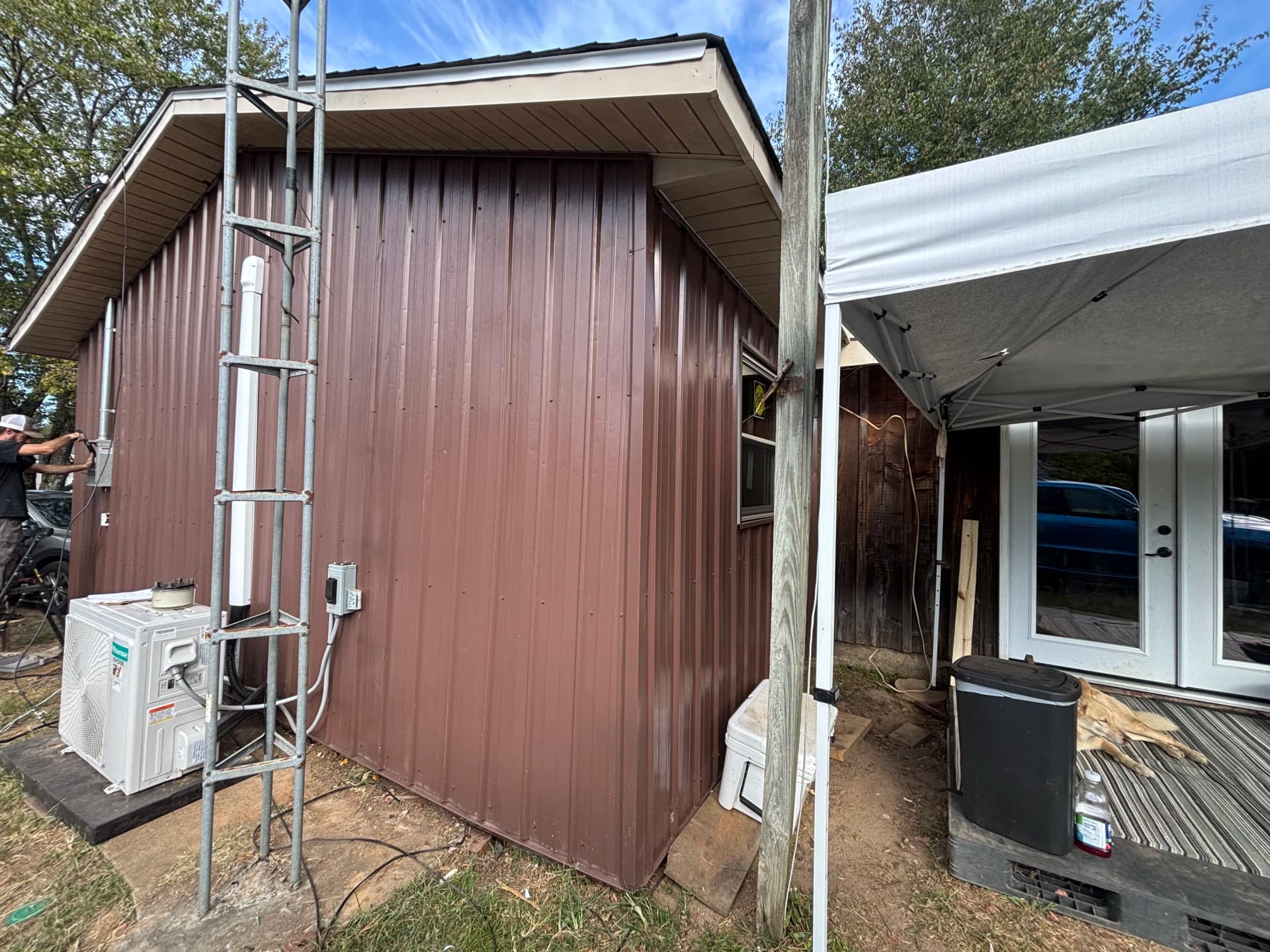Gallery photos for Old Wood Siding Replaced With Clean Metal Panel Finish: Image #6